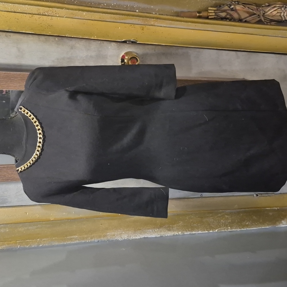 Elegant Black Dress with Gold Chain